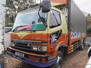 Mitsubishi 2000 Orange