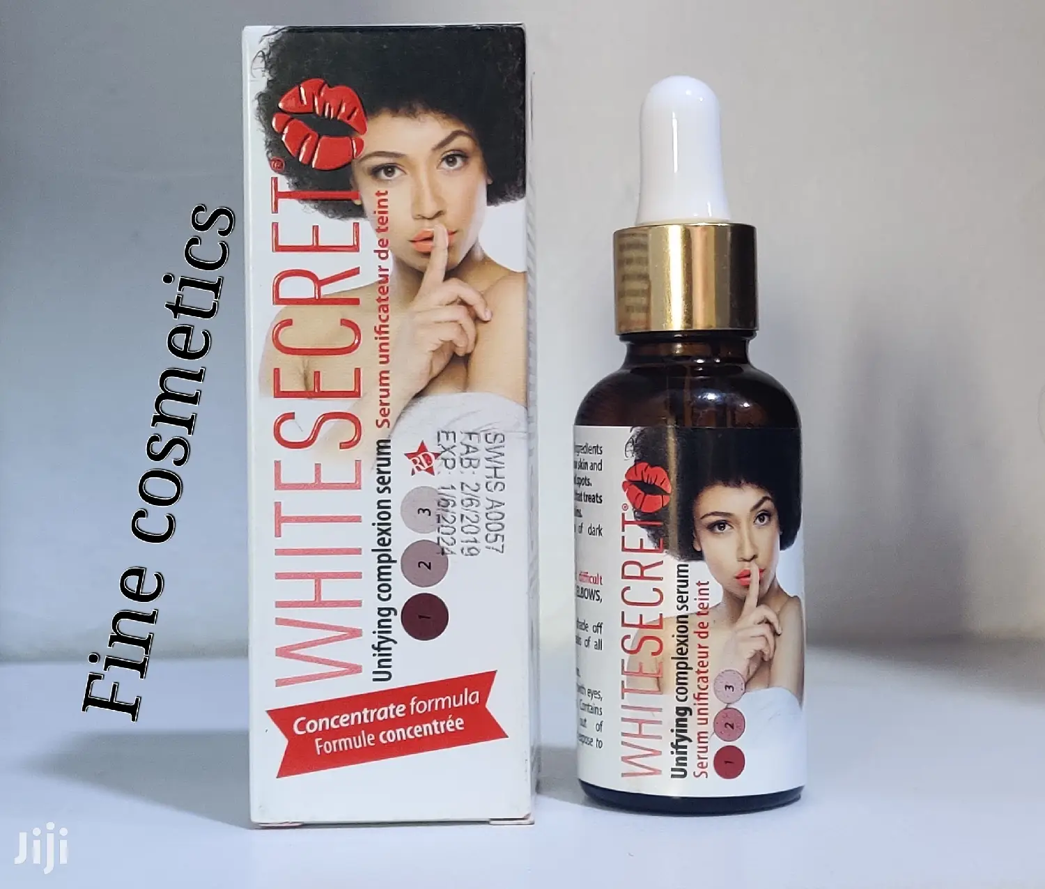 White Secret Lightening Unifying Complexion Vitamin E Serum.