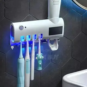 Tooth Brush Sterilizer/Tooth Paste Dispenser