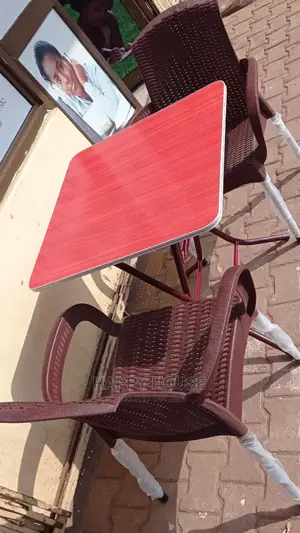 A Set of Foldable Table and 2 Plastic Strong Chairs