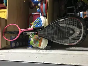 Head Ti Tennis Racket and a Mini Tennis Pro