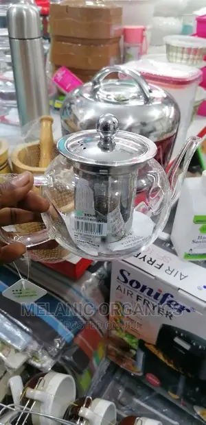 Glass Tea Pot With A Residue Filter