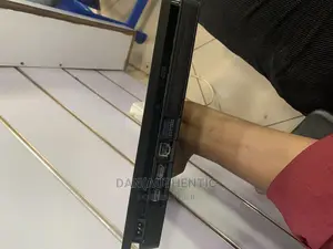 Sony Ps4 Slim Console With 2 Original Pads and 1 Game