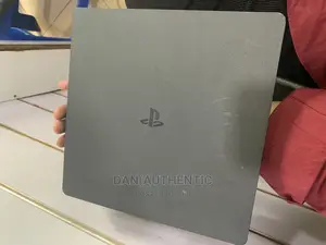Sony Ps4 Slim Console With 2 Original Pads and 1 Game