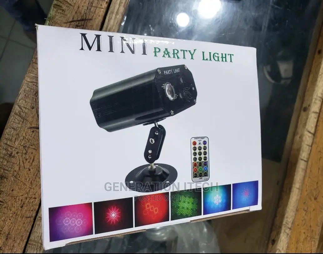 L.E.D Mini Party Laser Spot Disco Light With Remote Control