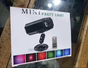 L.E.D Mini Party Laser Spot Disco Light With Remote Control