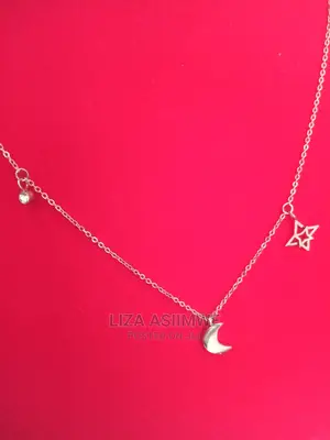 Rose Gold Stainless Steel Moon and Star Necklace Available