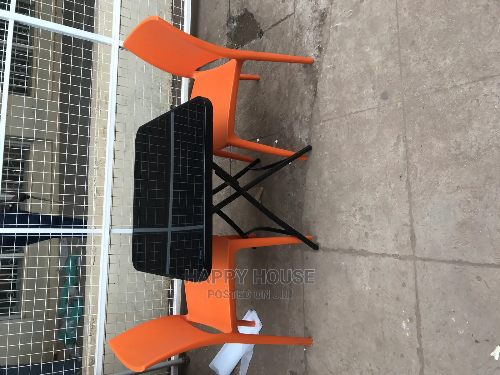 Foldable Table and Two Strong Plastic Chairs