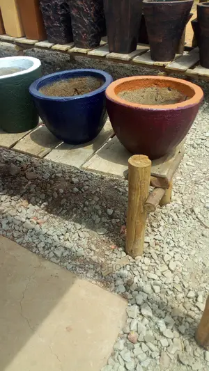 Beautiful Customized and Already Made Concrete Planters.