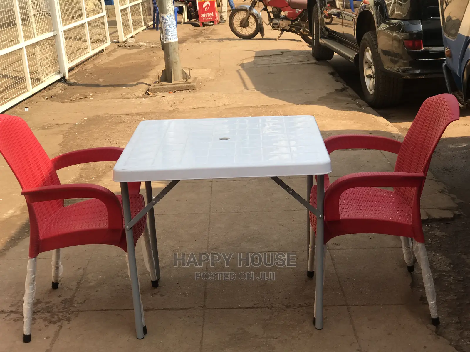 Set of Table and Two Plastic Chairs