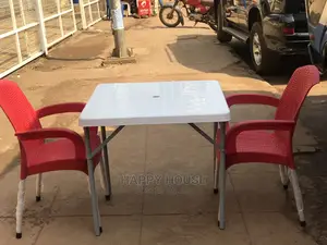 Set of Table and Two Plastic Chairs